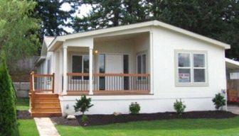 Model 1283-CT with Prime Trim Eave facia & window trim & 20' Dormer, covere Fornt porch with Railings